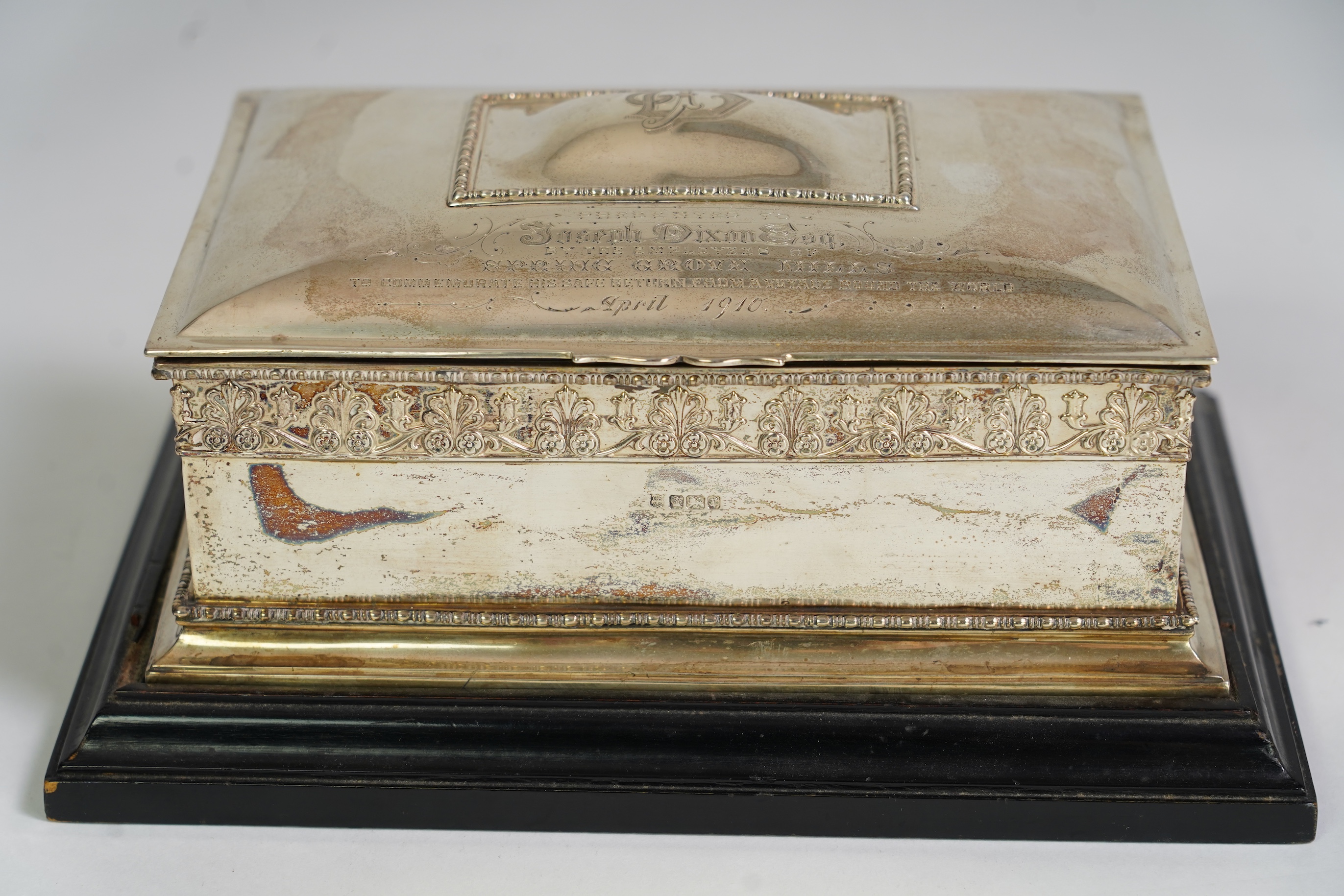 An Edwardian silver presentation cigar box, by Cooper Brothers and Sons